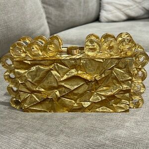 Cult Gaia Harlow Ring Crinkled Metallic Clutch Bag